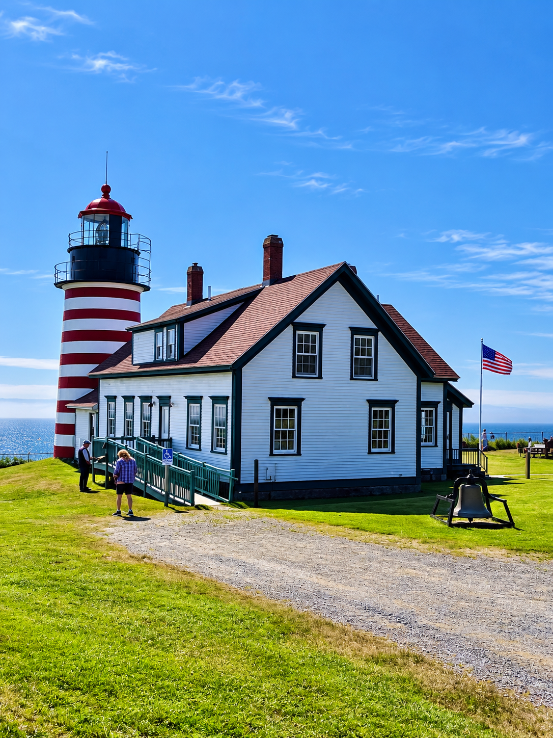 West Quoddy Head Lighthouse and keeper's house beside the ocean
